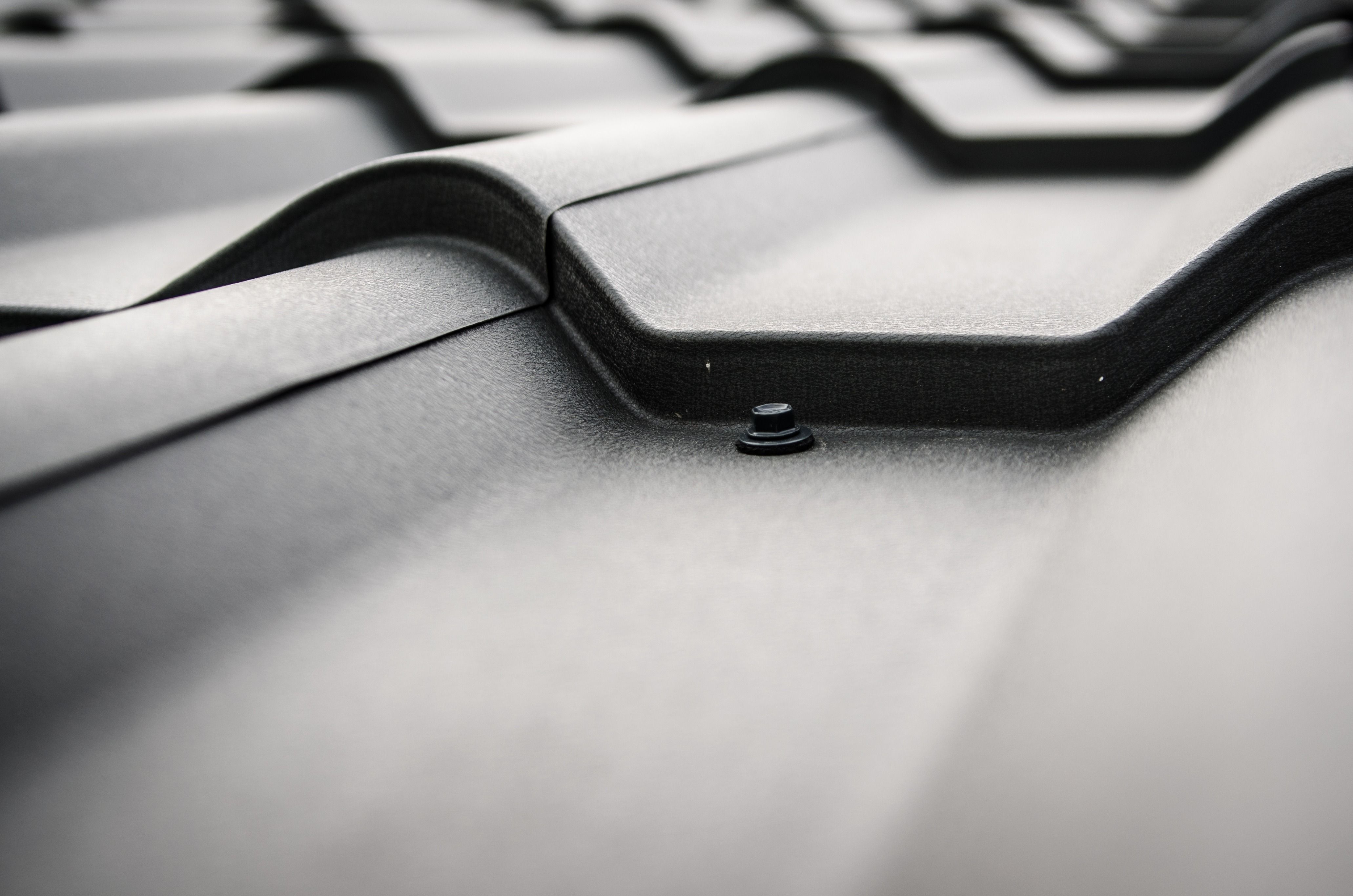 Professional roofing installation on commercial building